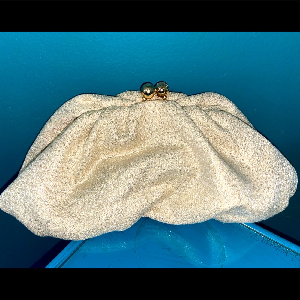 Beautiful gold Kate Landry clutch with chain link gold strap